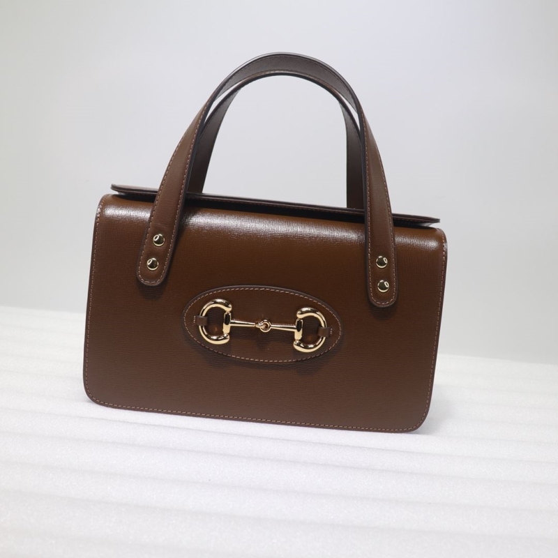 G*u*i top handle bags